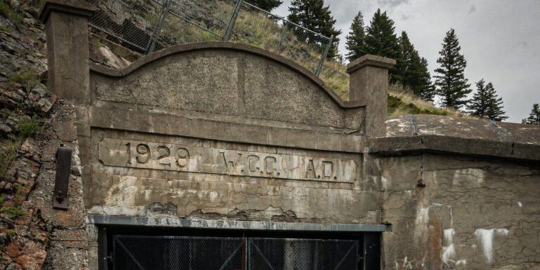 A closeup of the entrance to the Bellevue Mine, with 1929 engraved above the entry