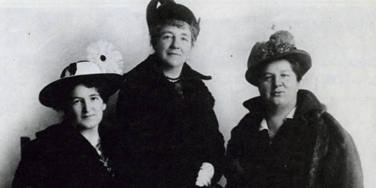 From left to right, Nellie McClung, Alice Jamieson, and Emily Murphy posing together for a photo