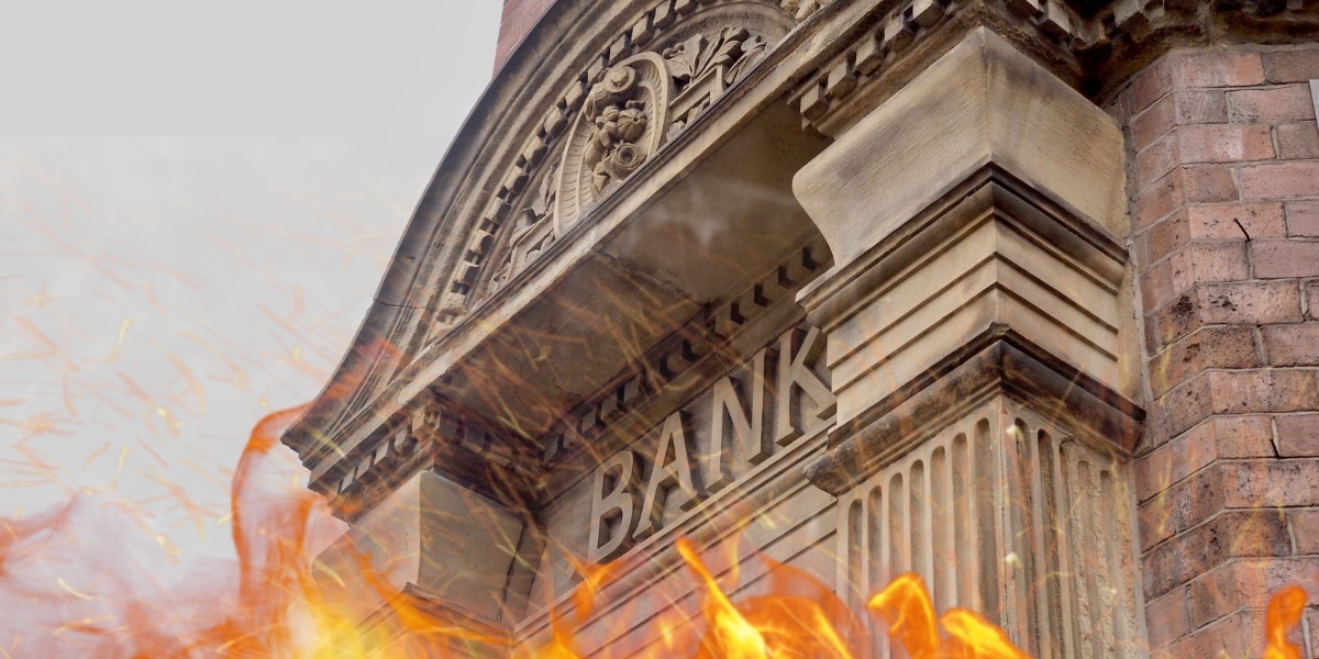 A generic image of a gothic style bank with an overlay of orange flames
