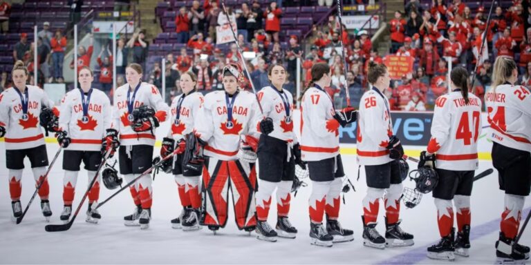 canadian women's national team looking dissappointed during the award ceremony after losing to the usa on sunday