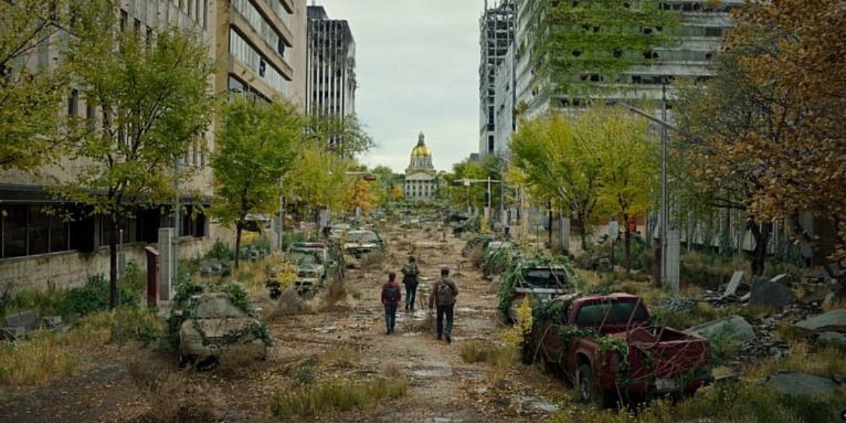 edmontons 108th street transformed for the last of us tv series featuring buildings and cars overtaken by nature