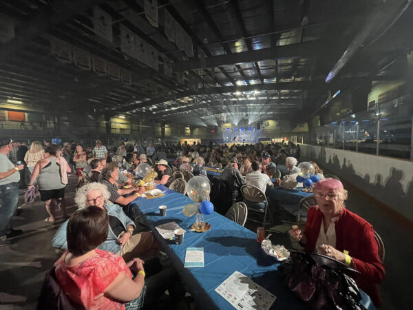 Image showing Crowd at the Carstairs Memorial Arena taking in the Mountain View Tornado Benefit Concert on July 29