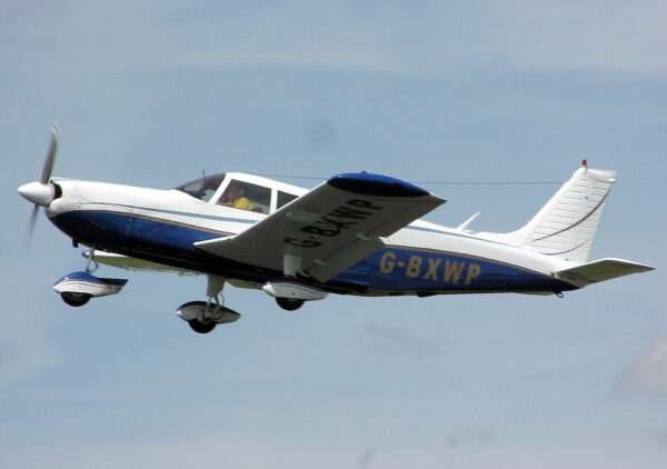 a photo of the piper pa32 aircraft in the air
