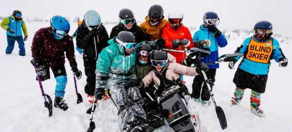 A photo of disabled skiers enjoying winter snow.
