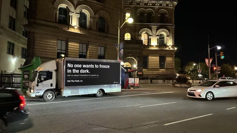 photo of a truck with a billboard on the side