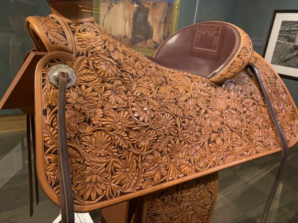 Incredibly detailed embellishing done by Chuck Stormes. The saddle is on display at the National Cowboy and Western Heritage Museum | Nat'l Cowboy Museum | X