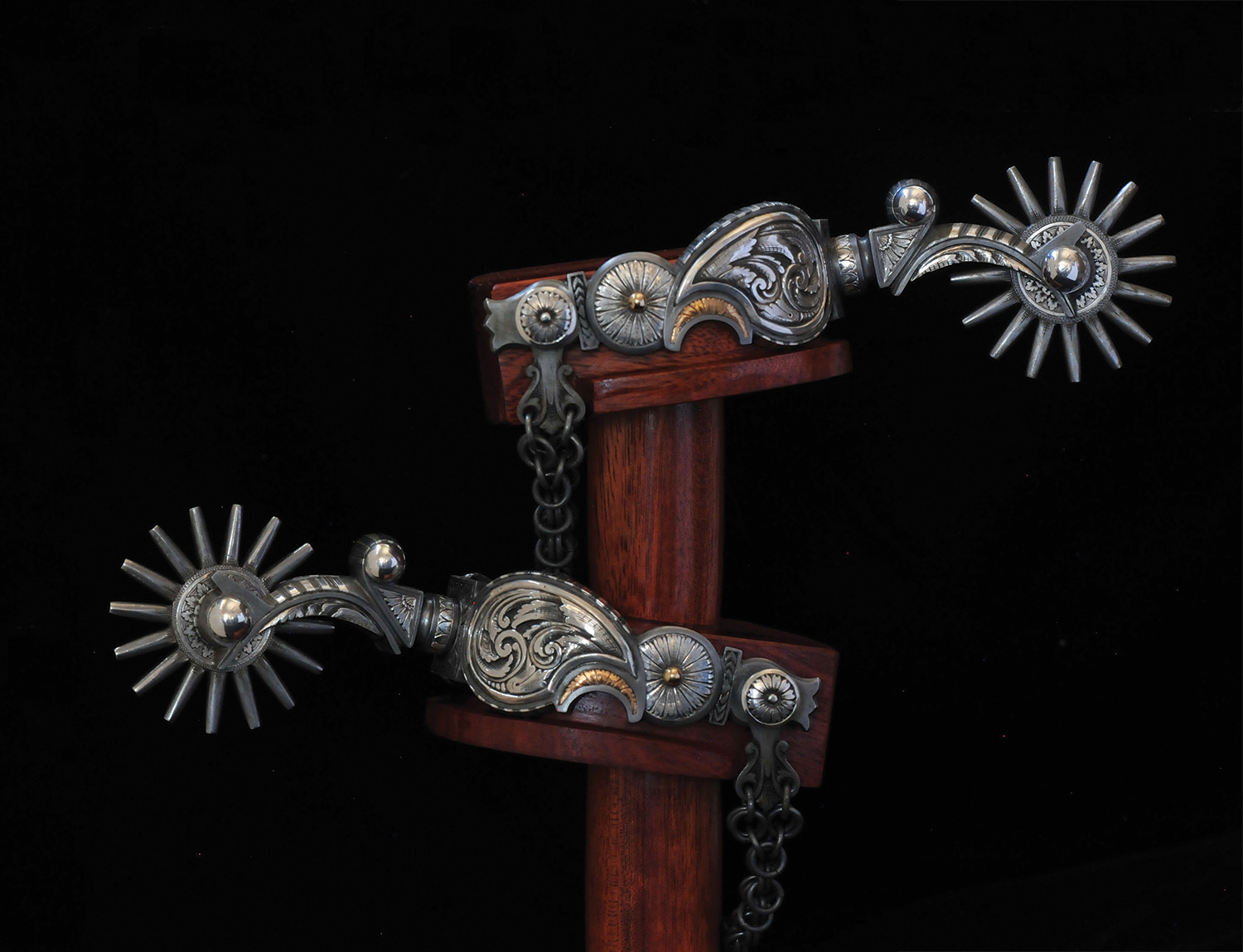 California-style Buckaroo Spurs crafted by Ernie Marsh on display at a TCAA exhibit | Western Art and Architecture