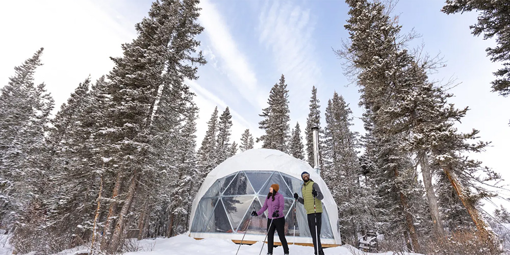 If you want to winter camp in style, try glamping or comfort camping like this dome hut at Refuge Bay northwest of Edmonton | Travel Alberta