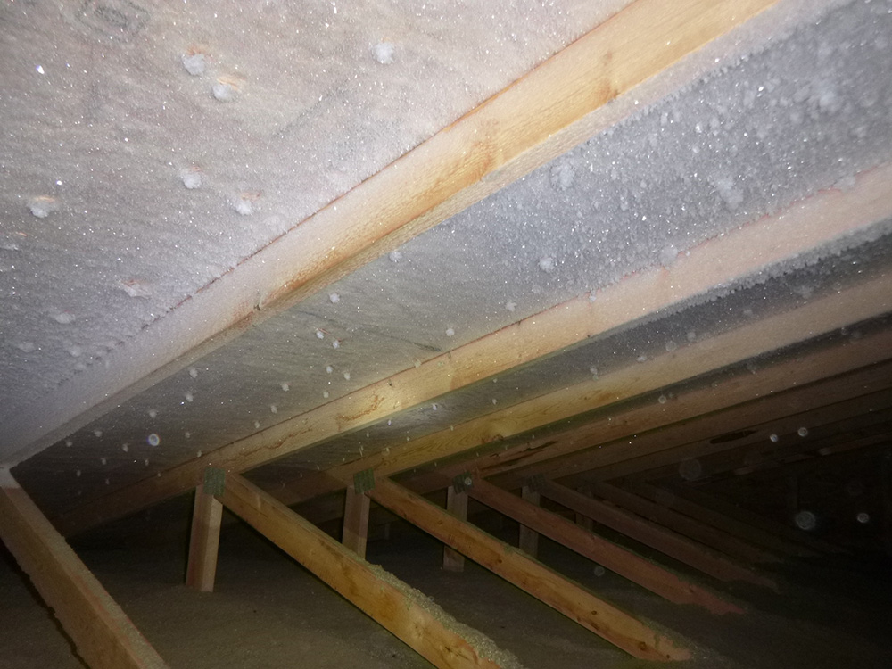The “attic frost” seen here will turn into “attic rain” once temperatures warm above freezing | Alberta Property Inspection
