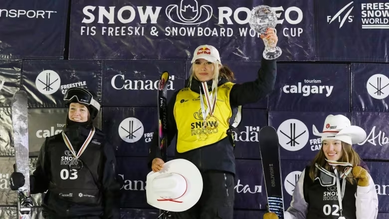 Eileen Gu stands on the podium at the FIS World Cup freeski halfpipe final in Calgary | Dave Chidley | The Canadian Press | CBC News