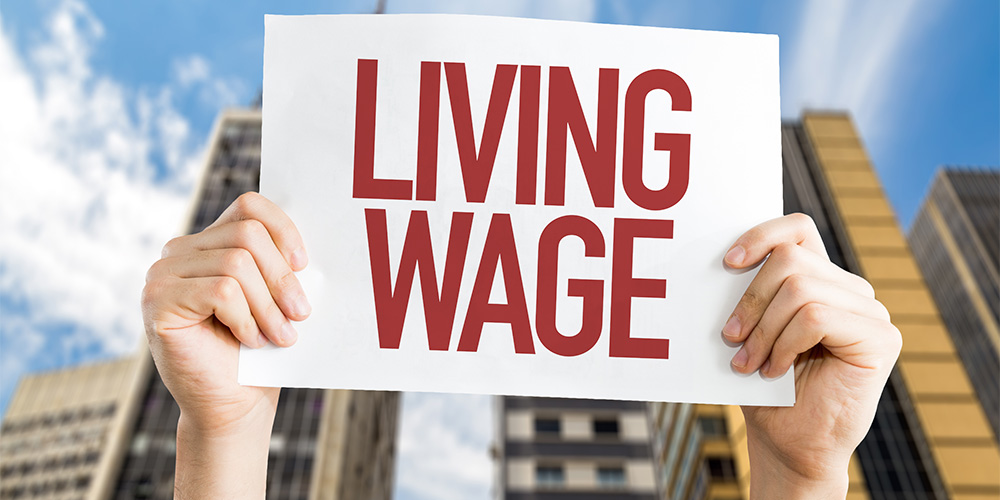 While the Alberta government won’t be increasing the minimum wage any time soon, private companies across the province are now offering their workers a living wage based on the region they live. | Canva
