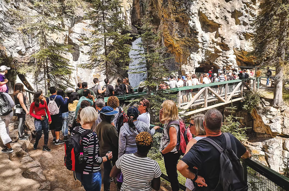 Summer crowds at Johnston Canyon in Banff National Park | travelwithasmile.com
