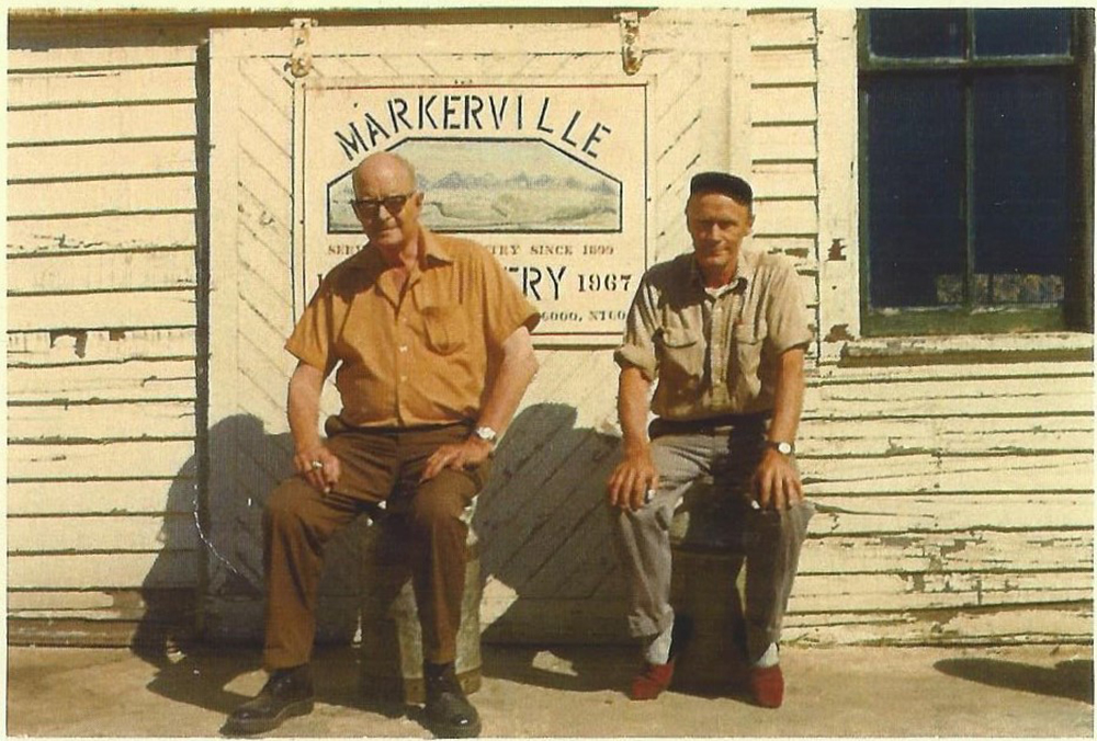 A photo of Carl Morkeberg (presumably right) outside of the Markerville creamery on the day it closed in 1972  Historic Markerville  Facebook