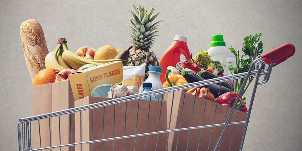 A shopping cart full of groceries