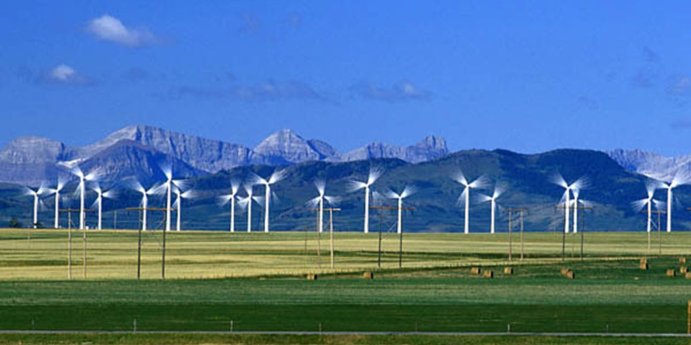 wind turbines and mountains near Pincher Creek by Mike Grandmaison photography