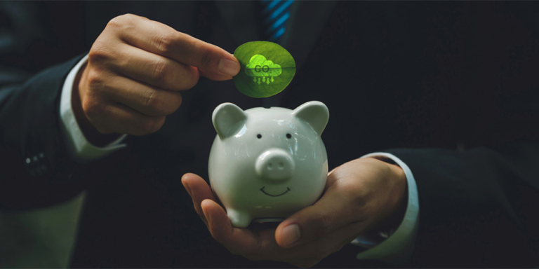 Putting green credits in a piggy bank