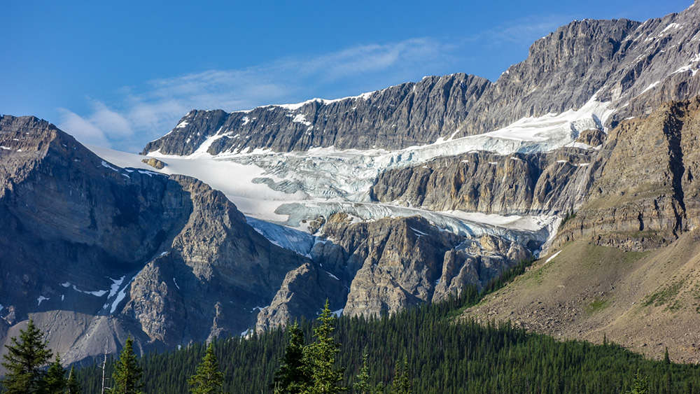 The iconic view of Mount Crowfoot and the Crowfoot Glacier from the popular Crowfoot Glacier Viewpoint at the south end of Bow Lake along the Icefields Parkway 