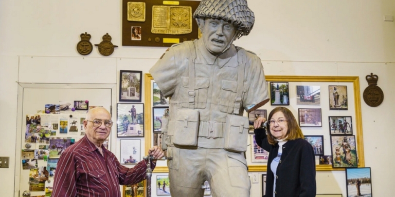Don and Shirley Begg with WW II sculpture