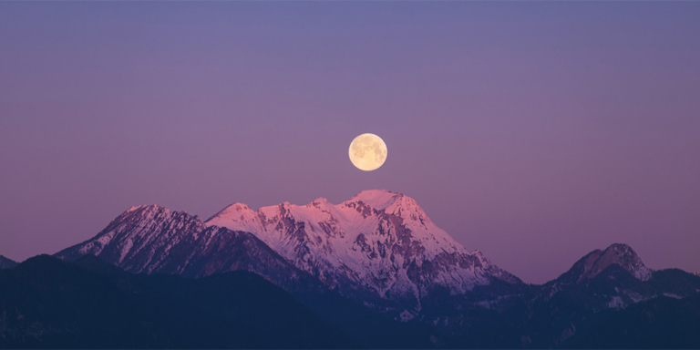 Full moon over mountains